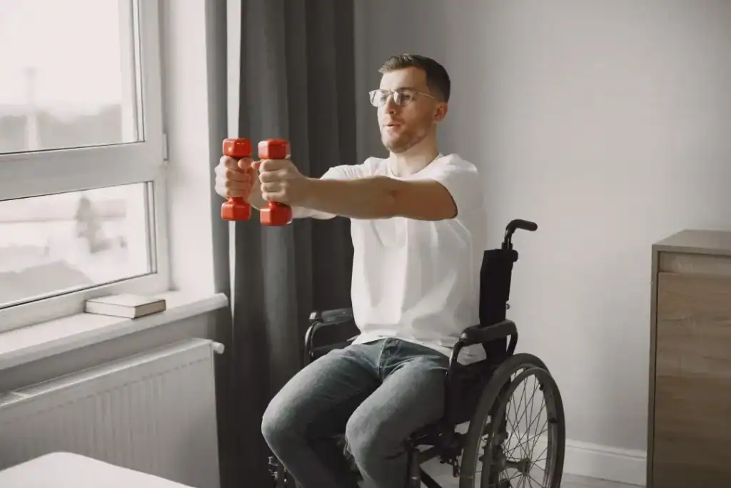 Image of man doing exercise in his wheelchair to aid weight loss Harlow