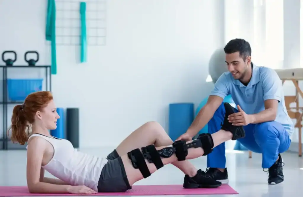 Debunking Meal Timing Myths: The Truth About Muscle Recovery 1 Woman having treatment to help muscle recovery Harlow after an injury