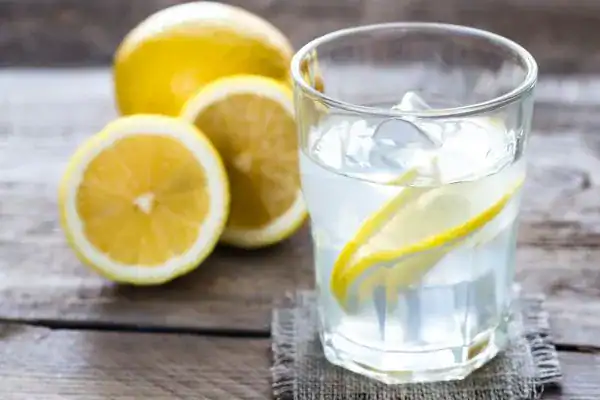 Hydration: The Secret Ingredient for a Toned Stomach and Enhanced Fitness 2 Image of lemon water to aid hydration Harlow